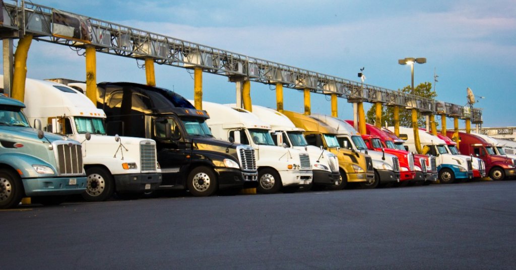 Line of trucks in parking lot